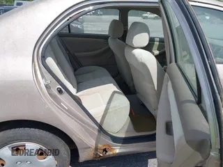2003 Toyota Corolla CE with VIN 2T1BR32E03C102501, listed as a IAAI auction lot 42158080 with 62,688 mi miles and . Bid and sale history available at DreamBid. Image 8.