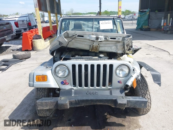 2006 Jeep Wrangler X with VIN 1J4FA39S36P703941, listed as a IAAI auction lot 42220361 with 148,829 mi miles and . Bid and sale history available at DreamBid. Image 12.