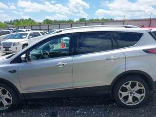 2017 Ford Escape Titanium with VIN 1FMCU0J99HUB23567, listed as a IAAI auction lot 42127795 with 93,056 mi miles. Bid and sale history available at carsss.com. Image 14.