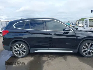 2017 BMW X1 sDrive28i with VIN WBXHU7C3XHP924635, listed as a IAAI auction lot 41744824 with 74,143 mi miles. Bid and sale history available at carsss.com. Image 13.