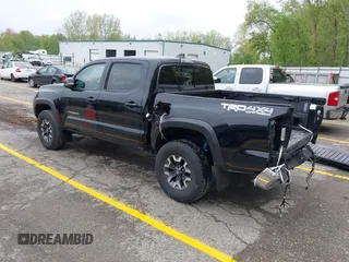 2021 Toyota Tacoma SR with VIN 3TMCZ5AN0MM417261, listed as a IAAI auction lot 42240693 with 38,625 mi miles and . Bid and sale history available at DreamBid. Image 3.