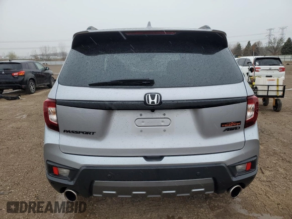 2023 Honda Passport TrailSport with VIN 5FNYF8H64PB044233, listed as a Copart auction lot 53522015 with 10,458 mi miles and Salvage title. Bid and sale history available at DreamBid. Image 6.