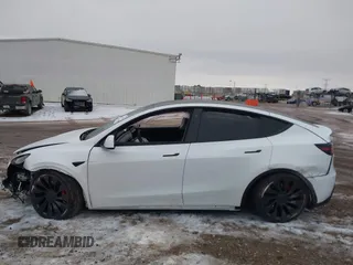2021 Tesla Model Y Performance with VIN 5YJYGDEF6MF261711, listed as a IAAI auction lot 41176208 with 25,687 mi miles and . Bid and sale history available at DreamBid. Image 14.