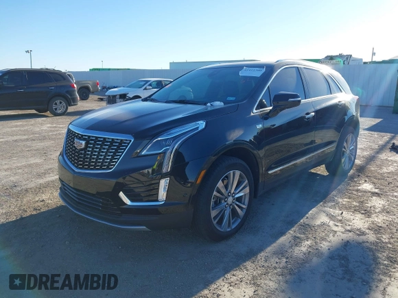 2024 Cadillac XT5 FWD Premium Luxury with VIN 1GYKNCRS4RZ729461, listed as a IAAI auction lot 41411300 with 5,760 mi miles. Bid and sale history available at carsss.com. Image 2.