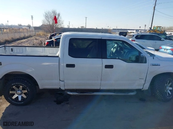 2015 Ford F-150 XLT w/HD Payload Pkg with VIN 1FTFW1EG7FFB09470, listed as a IAAI auction lot 41455246 with 152,766 mi miles. Bid and sale history available at carsss.com. Image 13.