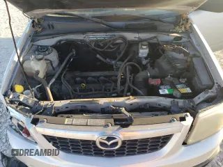 2011 Mazda Tribute Touring with VIN 4F2CY0C73BKM05324, listed as a Copart auction lot 48616125 with 97,376 mi miles and Salvage Title. Bid and sale history available at carsss.com. Image 12.