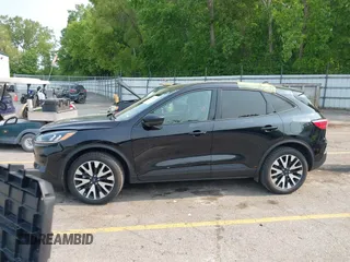 2020 Ford Escape SE Sport Hybrid with VIN 1FMCU9BZ4LUC25970, listed as a IAAI auction lot 42404984 with 102,651 mi miles and . Bid and sale history available at DreamBid. Image 14.