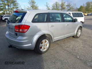 2013 Dodge Journey American Value with VIN 3C4PDCAB3DT610374, listed as a IAAI auction lot 40899147 with 133,386 mi miles and . Bid and sale history available at DreamBid. Image 4.