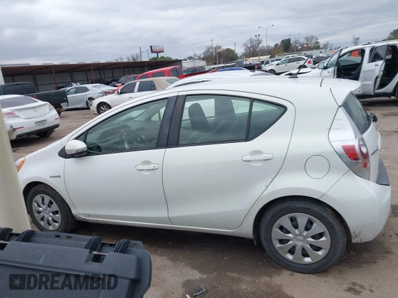 2014 Toyota Prius One with VIN JTDKDTB32E1084491, listed as a IAAI auction lot 41293744 with 132,110 mi miles and . Bid and sale history available at DreamBid. Image 14.