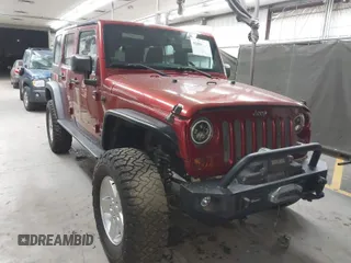 2013 Jeep Wrangler Unlimited Sport z VIN 1C4BJWDG5DL589311, wystawiony jako IAAI lot #41804006 z przebiegiem 95 117 mil mil oraz . Historia ofert i sprzedaży dostępna na DreamBid. Obrazek 1.