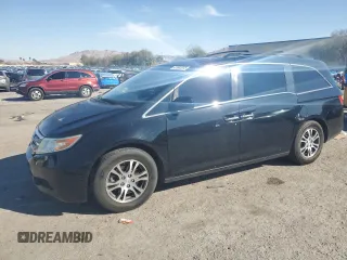 2012 Honda Odyssey EX-L with VIN 5FNRL5H64CB052869, listed as a Copart auction lot 47685375 with 168,449 mi miles and Salvage Title. Bid and sale history available at DreamBid. Image 1.