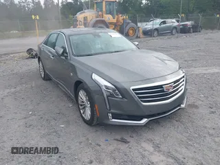 2016 Cadillac CT6 Luxury RWD z VIN 1G6KC5RX4GU158988, wystawiony jako IAAI lot #42199150 z przebiegiem 50 970 mil mil oraz . Historia ofert i sprzedaży dostępna na DreamBid. Obrazek 1.