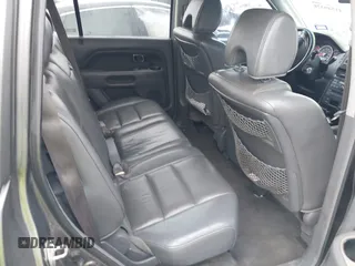 2007 Honda Pilot EX-L with VIN 5FNYF18697B002843, listed as a IAAI auction lot 41549328 with 202,365 mi miles and . Bid and sale history available at DreamBid. Image 8.