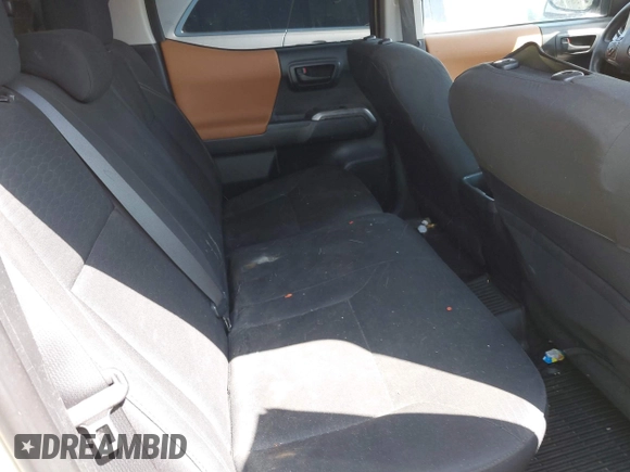 2017 Toyota Tacoma SR5 z VIN 3TMAZ5CN1HM026355, wystawiony jako IAAI lot #42060428 z przebiegiem 165 096 mil mil oraz . Historia ofert i sprzedaży dostępna na DreamBid. Obrazek 8.