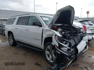 2020 Chevrolet Suburban LT z VIN 1GNSCHKC9LR284936, wystawiony jako IAAI lot #41196246 z przebiegiem Nie podano mil oraz . Historia ofert i sprzedaży dostępna na DreamBid. Obrazek 1.