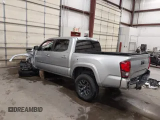 2023 Toyota Tacoma SR with VIN 3TMCZ5AN9PM604793, listed as a IAAI auction lot 42251347 with 39,741 mi miles and . Bid and sale history available at DreamBid. Image 3.