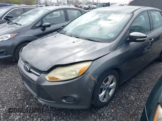 2013 Ford Focus SE z VIN 1FADP3F29DL125404, wystawiony jako IAAI lot #41957990 z przebiegiem 187 000 mil mil oraz . Historia ofert i sprzedaży dostępna na DreamBid. Obrazek 6.