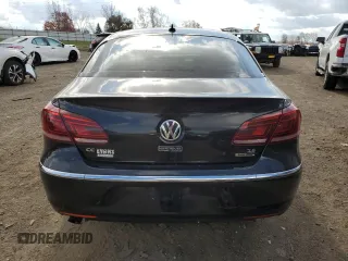 2013 Volkswagen CC VR6 Executive 4Motion with VIN WVWGU7AN1DE550824, listed as a Copart auction lot 77453544 with 0 mi miles and Salvage Title. Bid and sale history available at carsss.com. Image 6.