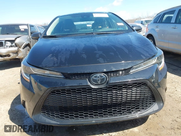 2021 Toyota Corolla LE with VIN 5YFEPMAEXMP161048, listed as a IAAI auction lot 42041751 with 30,650 mi miles and . Bid and sale history available at DreamBid. Image 12.