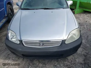 1999 Honda Civic EX with VIN 2HGEJ8649XH590637, listed as a IAAI auction lot 41584579 with 184,999 mi miles. Bid and sale history available at carsss.com. Image 6.
