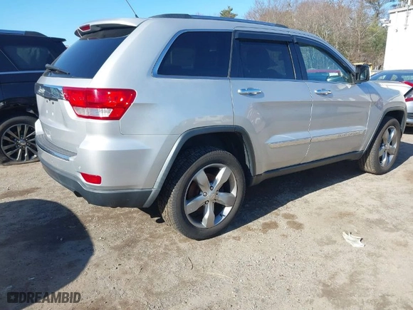 2013 Jeep Grand Cherokee Limited with VIN 1C4RJFBG5DC634023, listed as a IAAI auction lot 41828704 with 132,286 mi miles. Bid and sale history available at carsss.com. Image 4.