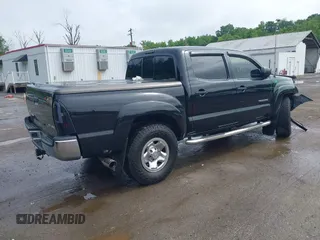 2011 Toyota Tacoma with VIN 3TMLU4EN9BM058136, listed as a IAAI auction lot 42470638 with 143,074 mi miles and . Bid and sale history available at DreamBid. Image 4.