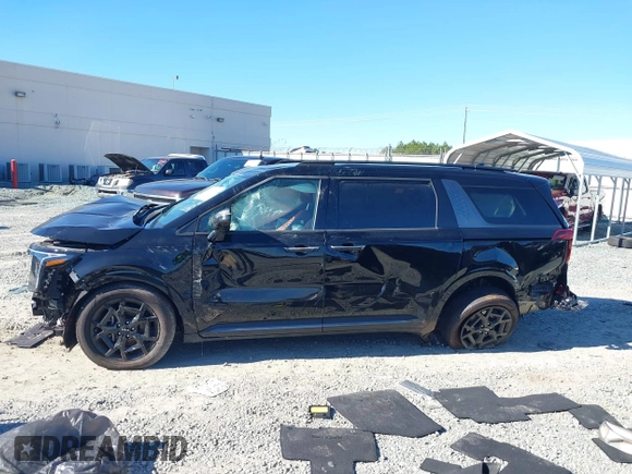 2025 Kia Carnival SX with VIN KNDNE5K35S6472142, listed as a IAAI auction lot 41280650 with 4,181 mi miles and . Bid and sale history available at DreamBid. Image 14.