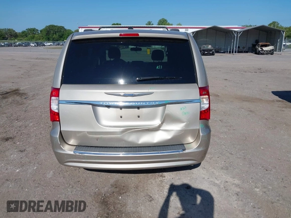 2014 Chrysler Town & Country Touring with VIN 2C4RC1BG4ER372629, listed as a IAAI auction lot 42060762 with 180,662 mi miles. Bid and sale history available at carsss.com. Image 16.