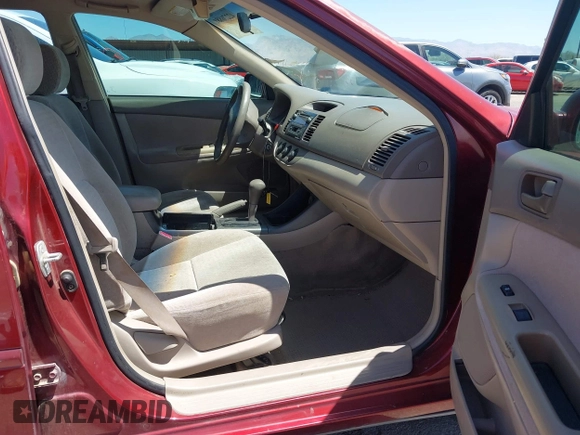 2002 Toyota Camry LE z VIN 4T1BE32K52U082454, wystawiony jako IAAI lot #42276881 z przebiegiem 225 814 mil mil oraz . Historia ofert i sprzedaży dostępna na DreamBid. Obrazek 5.