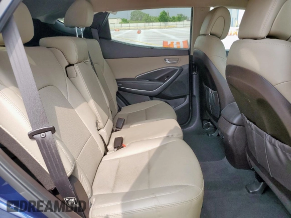 2017 Hyundai Santa Fe 2.4L z VIN 5XYZU3LB4HG401163, wystawiony jako Copart lot #57504375 z przebiegiem 84 964 mil mil oraz Szkoda całkowita • Salvage title. Historia ofert i sprzedaży dostępna na DreamBid. Obrazek 11.