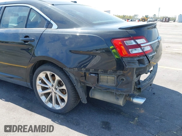 2015 Ford Taurus Limited with VIN 1FAHP2J81FG134973, listed as a IAAI auction lot 41845384 with 139,203 mi miles. Bid and sale history available at carsss.com. Image 18.