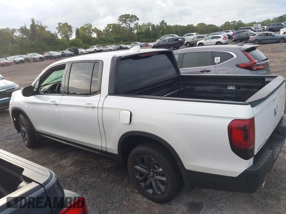 2023 Honda Ridgeline Sport z VIN 5FPYK3F14PB049364, wystawiony jako IAAI lot #40474507 z przebiegiem Nie podano mil oraz . Historia ofert i sprzedaży dostępna na DreamBid. Obrazek 14.