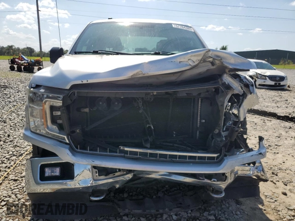 2018 Ford F-150 XL with VIN 1FTEW1EPXJFA95312, listed as a Copart auction lot 57764385 with 91,906 mi miles and Salvage title. Bid and sale history available at DreamBid. Image 5.