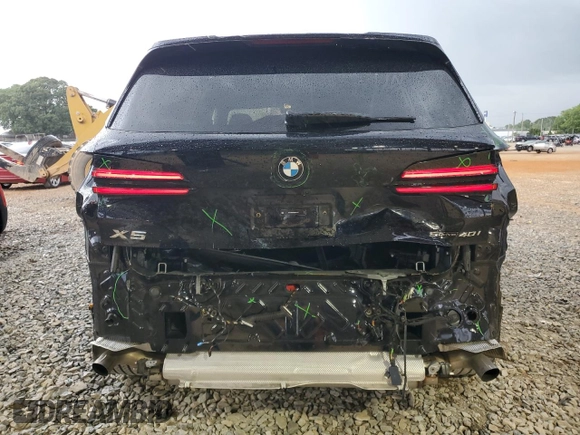 2024 BMW X5 sDrive40i with VIN 5UX13EU04R9T91552, listed as a Copart auction lot 55486545 with 12,995 mi miles and Salvage title. Bid and sale history available at DreamBid. Image 6.