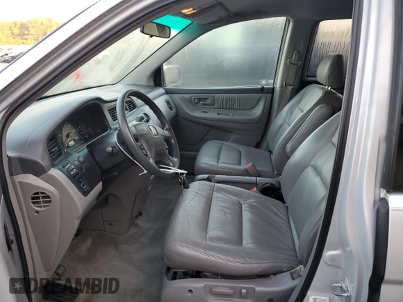 2003 Honda Odyssey EX-L with VIN 5FNRL18943B159553, listed as a Copart auction lot 72025294 with 182,942 mi miles and Salvage Title. Bid and sale history available at DreamBid. Image 7.