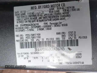 2012 Ford Fusion SE z VIN 3FAHP0HG0CR436745, wystawiony jako IAAI lot #41598812 z przebiegiem 116 305 mil mil oraz . Historia ofert i sprzedaży dostępna na DreamBid. Obrazek 9.