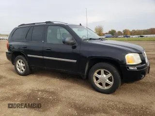 2007 GMC Envoy SLT with VIN 1GKDT13S972197393, listed as a Copart auction lot 77958764 with 151,586 mi miles and Salvage Title. Bid and sale history available at DreamBid. Image 4.