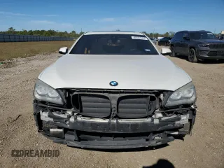 2014 BMW 7 Series 740Li with VIN WBAYE4C57ED138408, listed as a Copart auction lot 80553304 with 154,690 mi miles and Salvage Title. Bid and sale history available at carsss.com. Image 5.