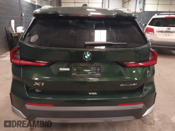 2023 BMW X1 xDrive28i with VIN WBX73EF02P5W02909, listed as a IAAI auction lot 41983574 with 14,743 mi miles. Bid and sale history available at carsss.com. Image 16.