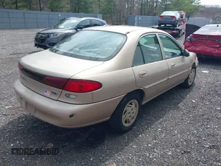 1998 Ford Escort SE z VIN 1FAFP13P5WW260085, wystawiony jako IAAI lot #42032363 z przebiegiem 93 084 mil mil oraz . Historia ofert i sprzedaży dostępna na DreamBid. Obrazek 4.