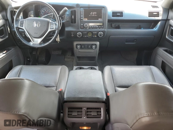 2012 Honda Ridgeline RTL with VIN 5FPYK1F56CB002709, listed as a Copart auction lot 62642495 with 116,416 mi miles and Salvage title. Bid and sale history available at DreamBid. Image 8.