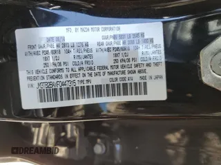 2015 Mazda CX-9 Sport z VIN JM3TB2BAXF0447315, wystawiony jako Copart lot #60842505 z przebiegiem 122 281 mil mil oraz Szkoda całkowita • Salvage title. Historia ofert i sprzedaży dostępna na DreamBid. Obrazek 13.