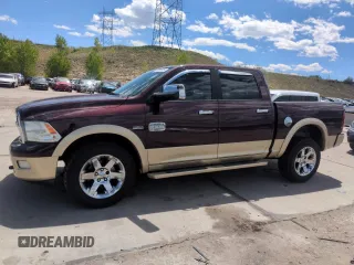 2012 Ram 1500 Laramie Longhorn with VIN 1C6RD7PT6CS206220, listed as a Copart auction lot 56650925 with 266,493 mi miles and Salvage title. Bid and sale history available at DreamBid. Image 1.