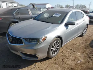 2019 Acura TLX with VIN 19UUB1F3XKA009385, listed as a IAAI auction lot 40584274 with 61,376 mi miles. Bid and sale history available at carsss.com. Image 2.