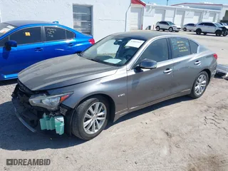 2014 Infiniti Q50 Hybrid Premium with VIN JN1AV7ARXEM703202, listed as a IAAI auction lot 41889569 with 144,749 mi miles. Bid and sale history available at carsss.com. Image 21.