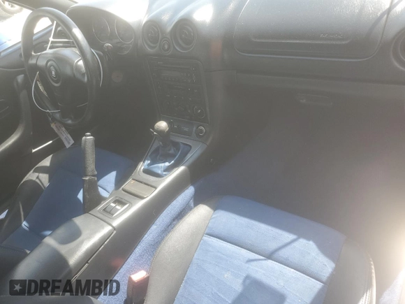 1999 Mazda MX-5 Miata with VIN JM1NB353XX0134898, listed as a Copart auction lot 63429475 with 140,595 mi miles and Clean title. Bid and sale history available at DreamBid. Image 8.