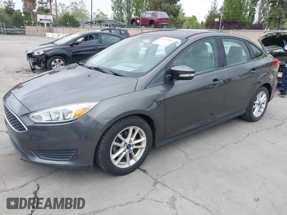 2015 Ford Focus SE with VIN 1FADP3F29FL342311, listed as a IAAI auction lot 42109683 with 70,579 mi miles. Bid and sale history available at carsss.com. Image 2.