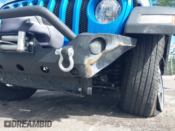2022 Jeep Wrangler Unlimited Sport with VIN 1C4HJXDG3NW117155, listed as a IAAI auction lot 40240879 with 36,323 mi miles and . Bid and sale history available at DreamBid. Image 6.