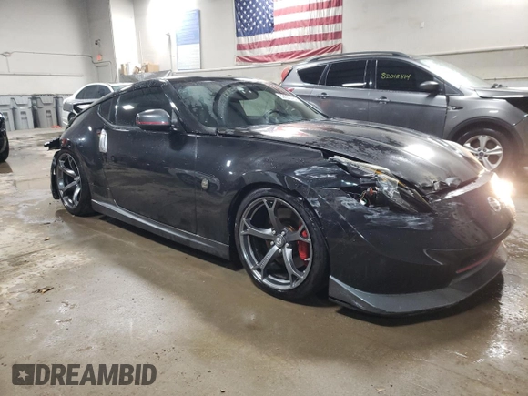 2014 Nissan 370Z Nismo with VIN JN1AZ4EHXEM633754, listed as a Copart auction lot 82035784 with 55,793 mi miles and Salvage Title. Bid and sale history available at DreamBid. Image 4.