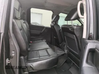 2010 Nissan Titan LE with VIN 1N6BA0EC8AN318538, listed as a Copart auction lot 74122194 with Not Provided miles and Salvage Title. Bid and sale history available at carsss.com. Image 10.